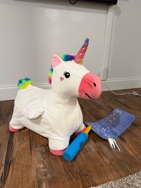 Plush Rainbow Unicorn Ride-On Toy